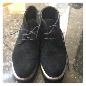 Black and brown men’s chukka boots